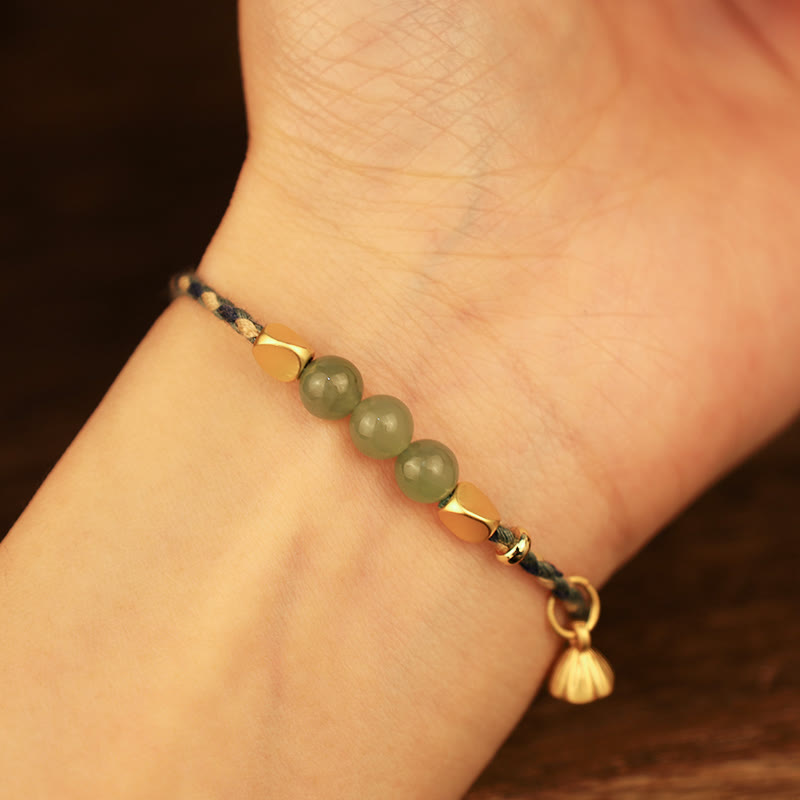 Pulsera trenzada de la suerte con dije de loto de jade hetiano hecho a mano con Buddha Stones
