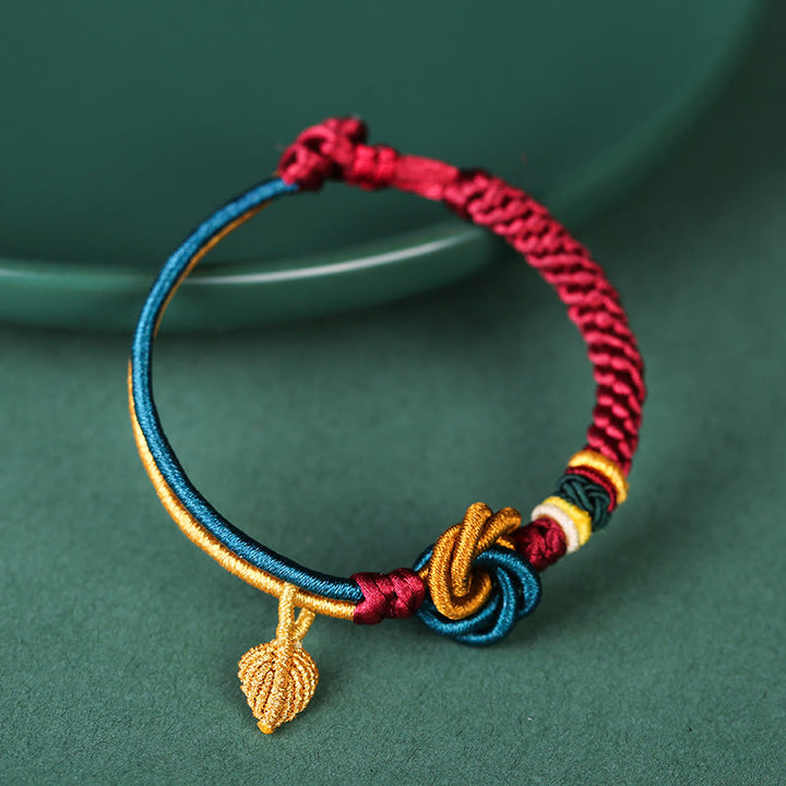 Pulsera de cuerda de la suerte con nudo de mandala hecha a mano tibetana con Buddha Stones