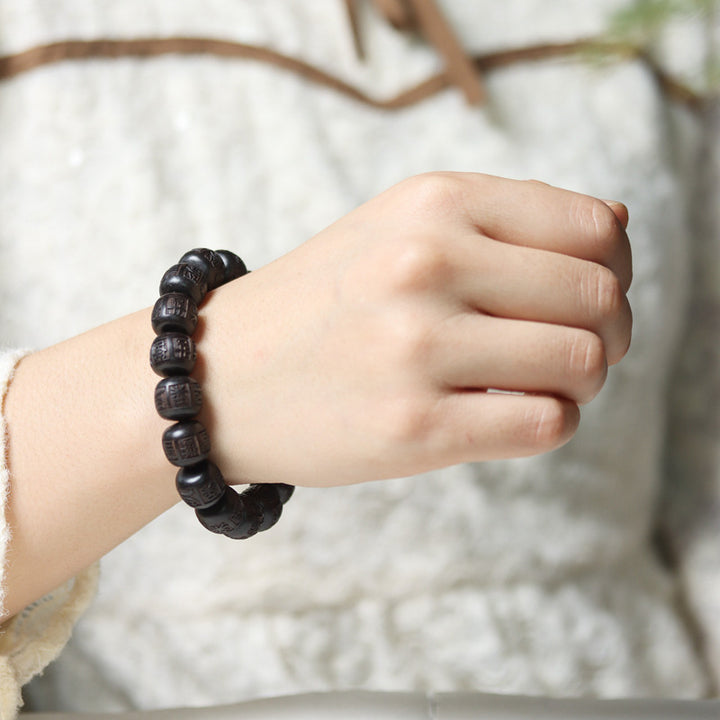 Pulsera de equilibrio grabada con Buddha Stones , madera de ébano del Tíbet, Om Mani Padme Hum