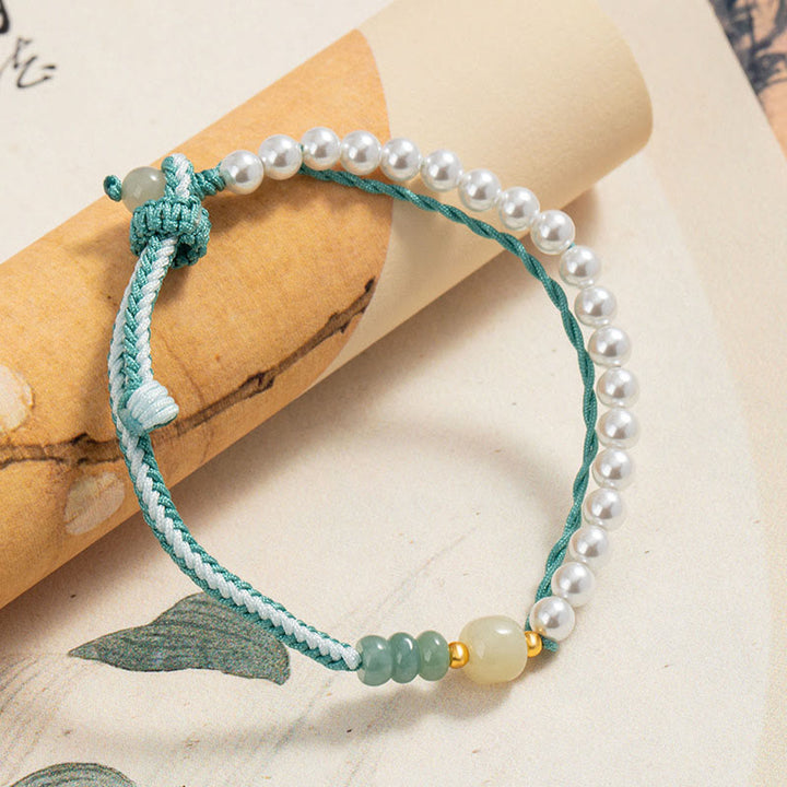 Pulsera de abundancia de perlas de cuerda trenzada de jade hetiano de plata de ley 925 con Buddha Stones