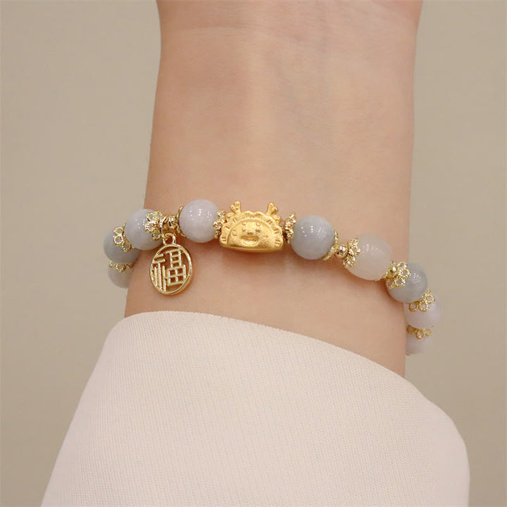 Buddha Stones Año del Dragón Ágata roja Cuarzo fresa Obsidiana negra Jade Granate Perla Cinabrio Bola de masa Dragón Suerte Fu Pulsera con personajes - image 22