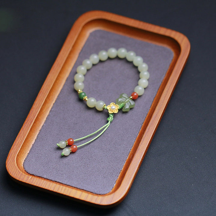 Pulsera de mariposa y flor de la suerte de jade de plata de ley 925 con Buddha Stones