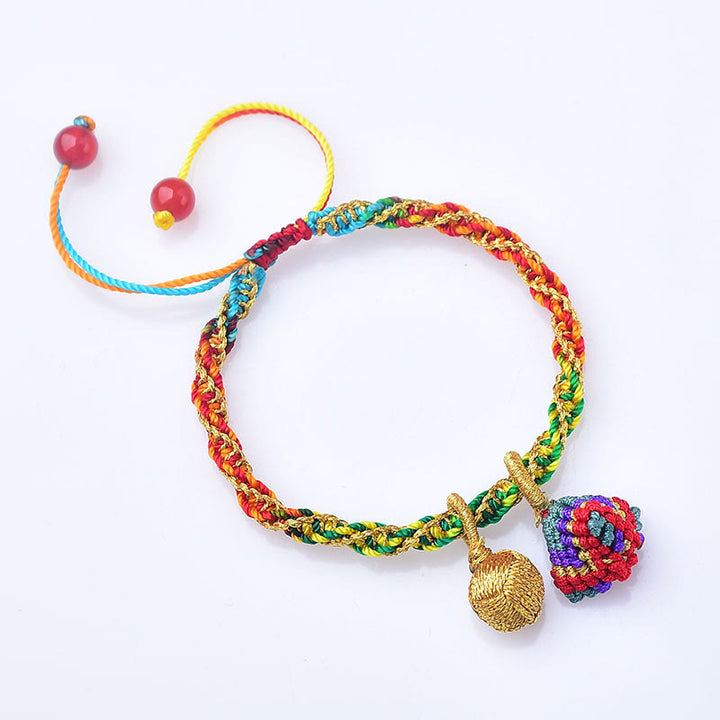 Pulsera con dijes Zongzi hecha a mano con cuerda colorida y Buddha Stones