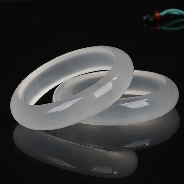 Pulsera de la suerte de la riqueza del jade de seda dorada translúcida natural de las Buddha Stones