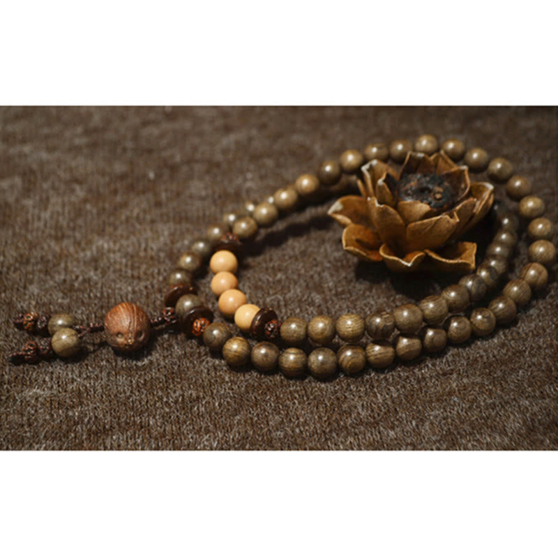 Pulsera Mala con dije de protección de sándalo tibetano