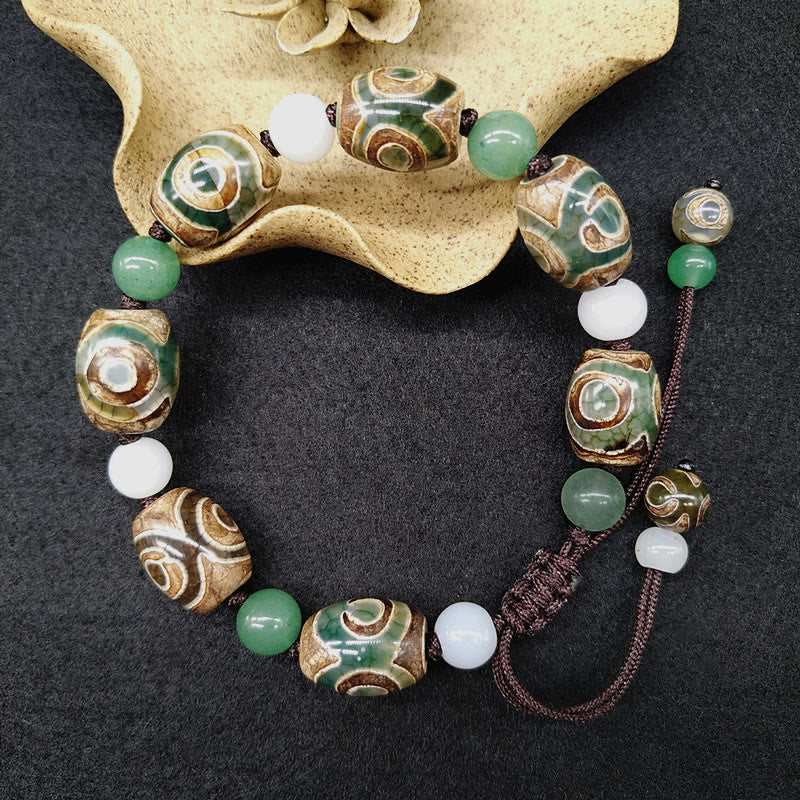 Pulsera trenzada de protección de la suerte con cuentas Dzi tibetanas de tres ojos con Buddha Stones