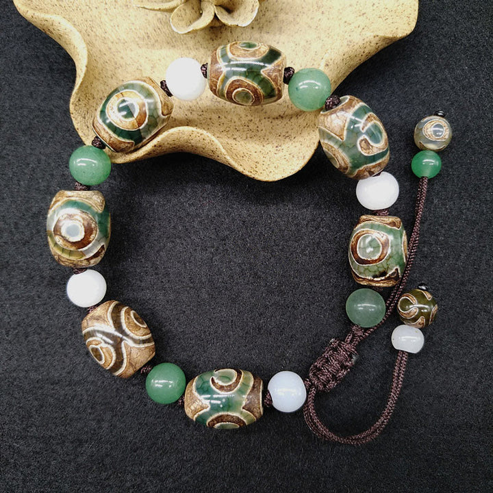 Pulsera trenzada de protección de la suerte con cuentas Dzi tibetanas de tres ojos con Buddha Stones