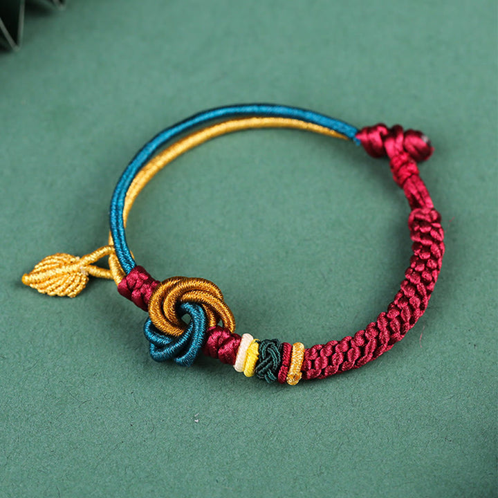Pulsera de cuerda de la suerte con nudo de mandala hecha a mano tibetana con Buddha Stones