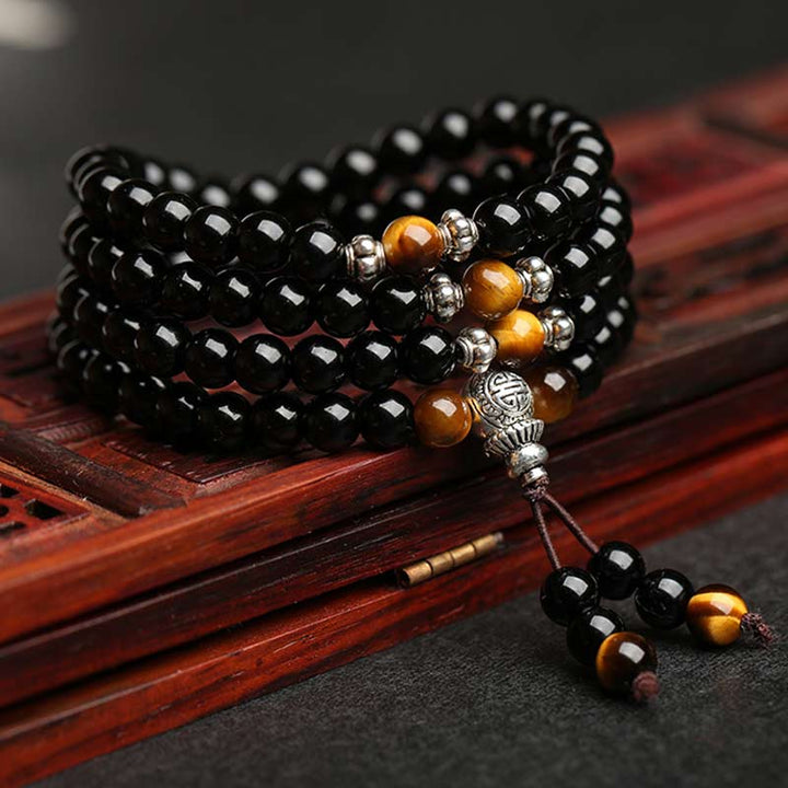 Pulsera Mala con bendición de ojo de tigre de obsidiana negra con Buddha Stones