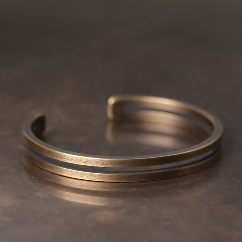 Pulsera vikinga de la suerte de cobre rústico con Buddha Stones