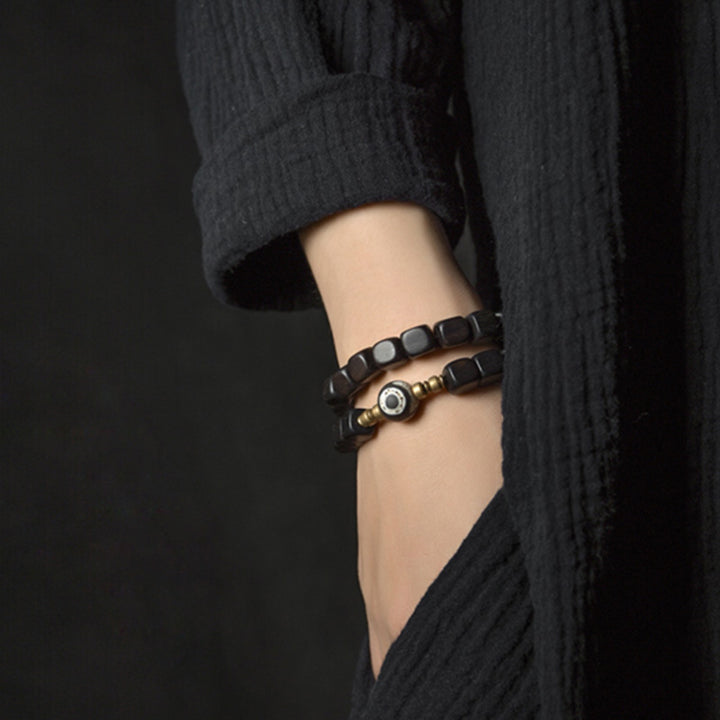 Pulsera de pareja de paz de cobre con cuentas Dzi de madera de ébano