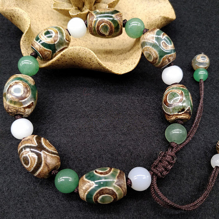 Pulsera trenzada de protección de la suerte con cuentas Dzi tibetanas de tres ojos con Buddha Stones