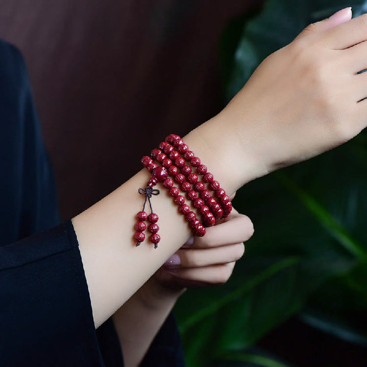 Buddha Stones 108 cuentas Mala cinabrio Om Mani Padme Hum patrón grabado pulsera de bendición