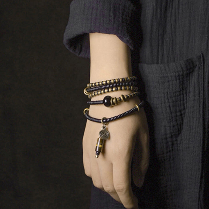 Buddha Stones madera de ébano cuentas Dzi cobre paz pareja pulsera collar colgante