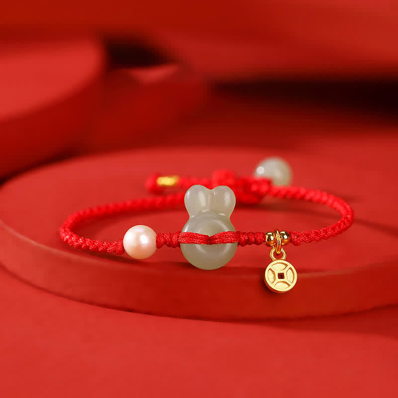 Pulsera de hilo rojo con moneda de cobre y jade hetiano del año del conejo en plata de ley 925