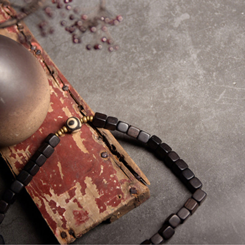 Pulsera de pareja de paz de cobre con cuentas Dzi de madera de ébano