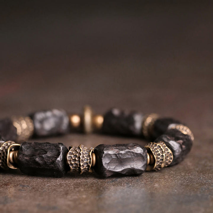 Pulsera de paz tranquila de cobre y madera de ébano tibetano con Buddha Stones