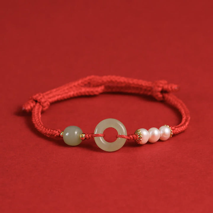 Pulsera de la suerte con hebilla de la paz y perlas de jade hetiano natural de Buddha Stones