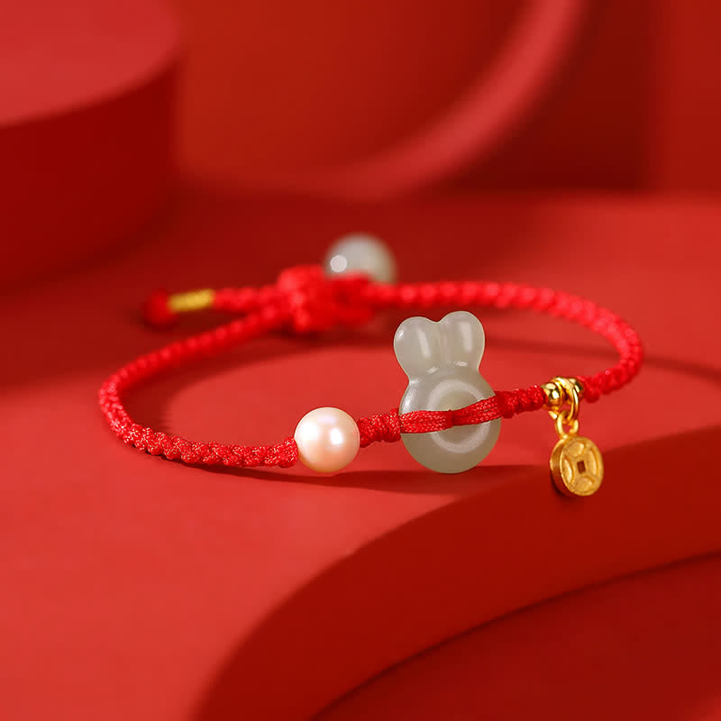 Pulsera de hilo rojo con moneda de cobre y jade hetiano del año del conejo en plata de ley 925