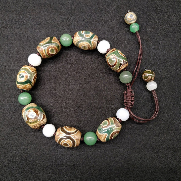 Pulsera trenzada de protección de la suerte con cuentas Dzi tibetanas de tres ojos con Buddha Stones
