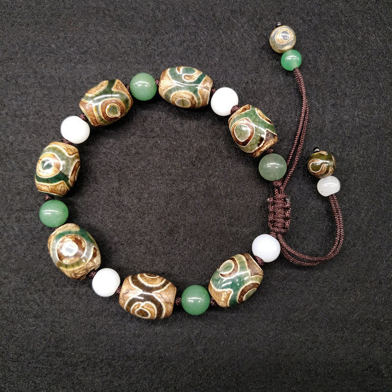 Pulsera trenzada de protección de la suerte con cuentas Dzi tibetanas de tres ojos con Buddha Stones