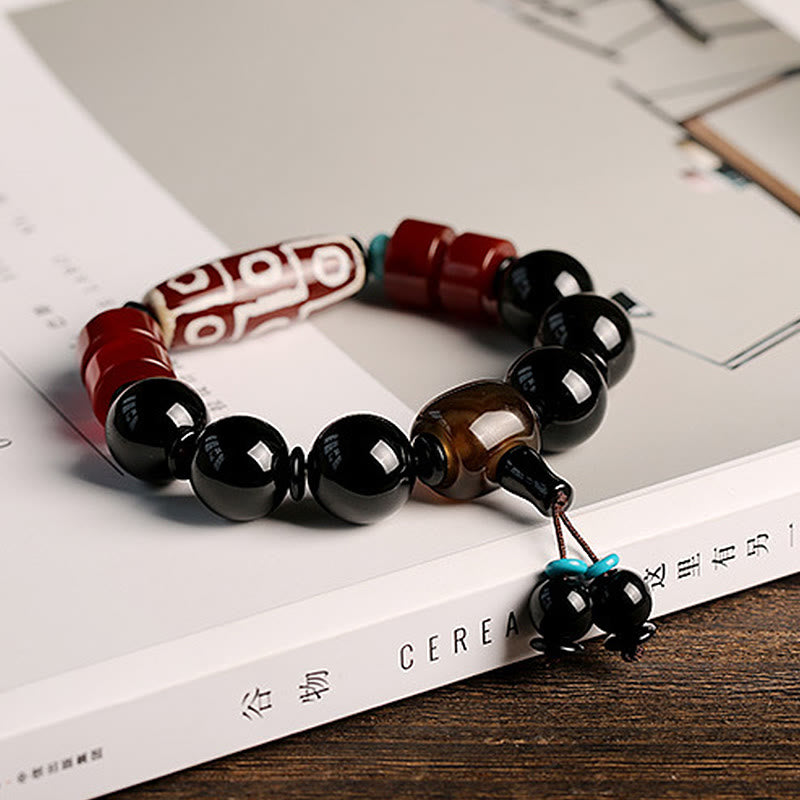Pulsera tibetana de protección de la riqueza de ónix negro con cuentas Dzi de nueve ojos