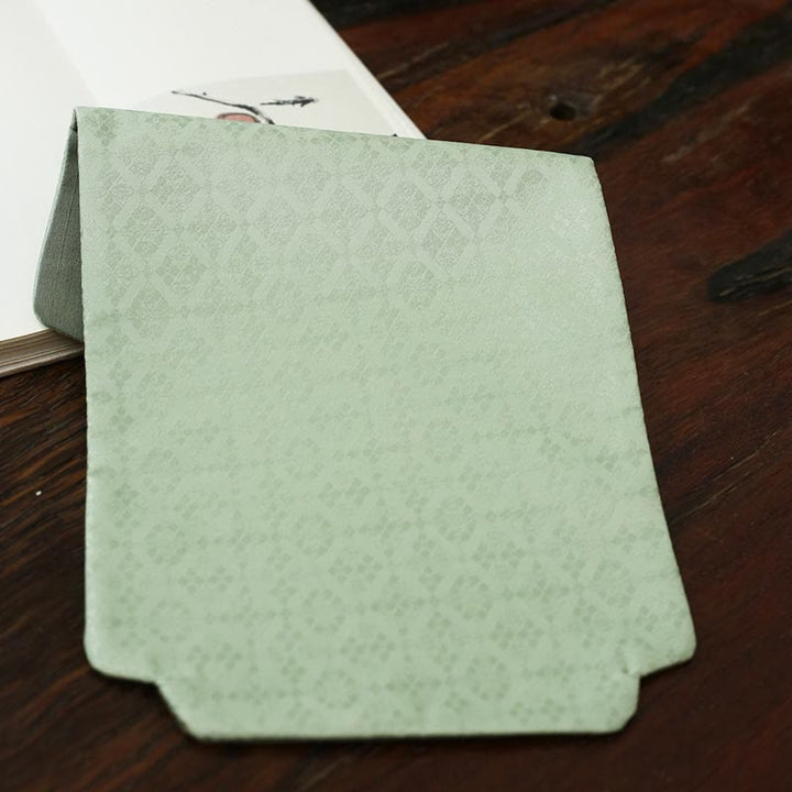 Posavasos para taza de té con diseño de brocado floral elegante