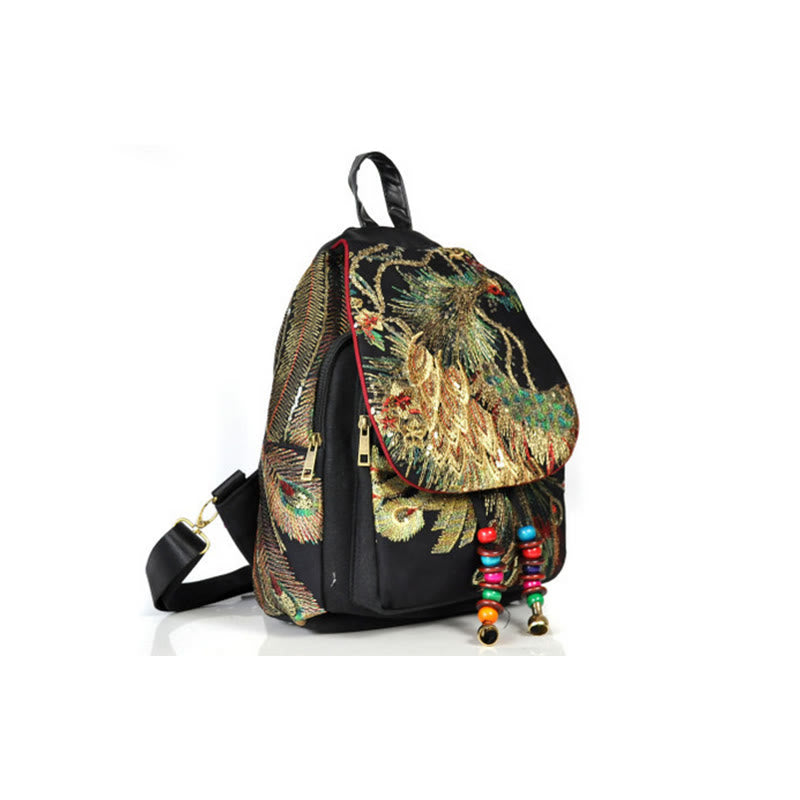 Mochila con borlas de lona con bordado de pavo real
