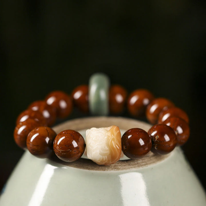 Pulsera de sabiduría de león danzante con semillas de Bodhi moradas con Buddha Stones