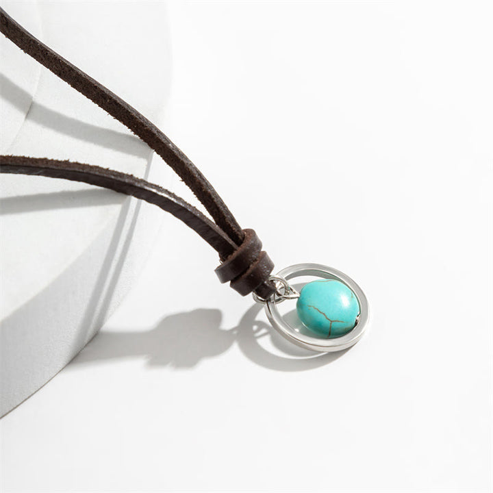 Colgante de collar de fuerza de protección de piedra turquesa redonda de Buddha Stones