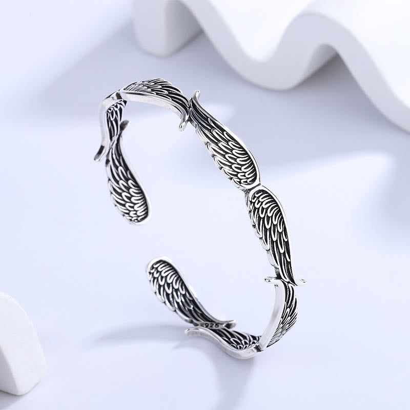 Brazalete de pulsera de la suerte tallada con patrón de plumas de alas de ángel de Buddha Stones
