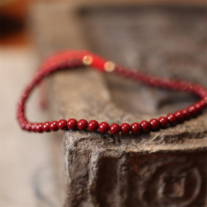 Pulsera tobillera trenzada con hilo rojo con bendición de cinabrio natural con Buddha Stones