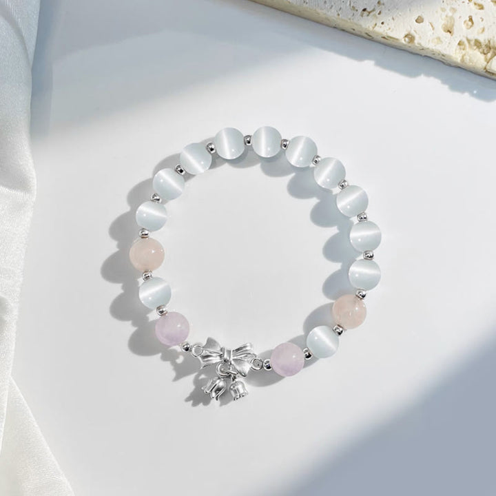 Pulsera con dije de roseta y amatista, lavanda, ojo de gato , Buddha Stones