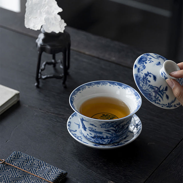 Buddha Stones Porcelana Azul Y Blanca Loto Pez Koi Danza Del León Sandía Cerámica Gaiwan Sancai Taza De Té Kung Fu Taza De Té Y Platillo Con Tapa 300ml