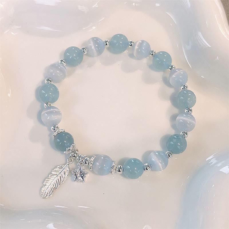 Pulsera con dije de estrella y plumas curativas de ojo de gato, aguamarina, plata de ley 925 con Buddha Stones
