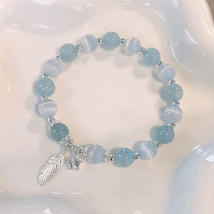Pulsera con dije de estrella y plumas curativas de ojo de gato, aguamarina, plata de ley 925 con Buddha Stones