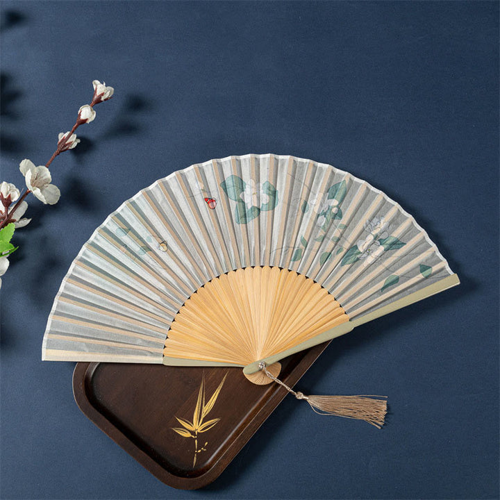 Abanico plegable de bambú de seda de mano con Buddha Stones , loto, flor de Begonia, jazmín, 21cm