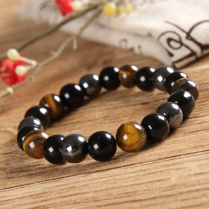 Juego de collar y pulsera de ojo de tigre tibetano con Buddha Stones