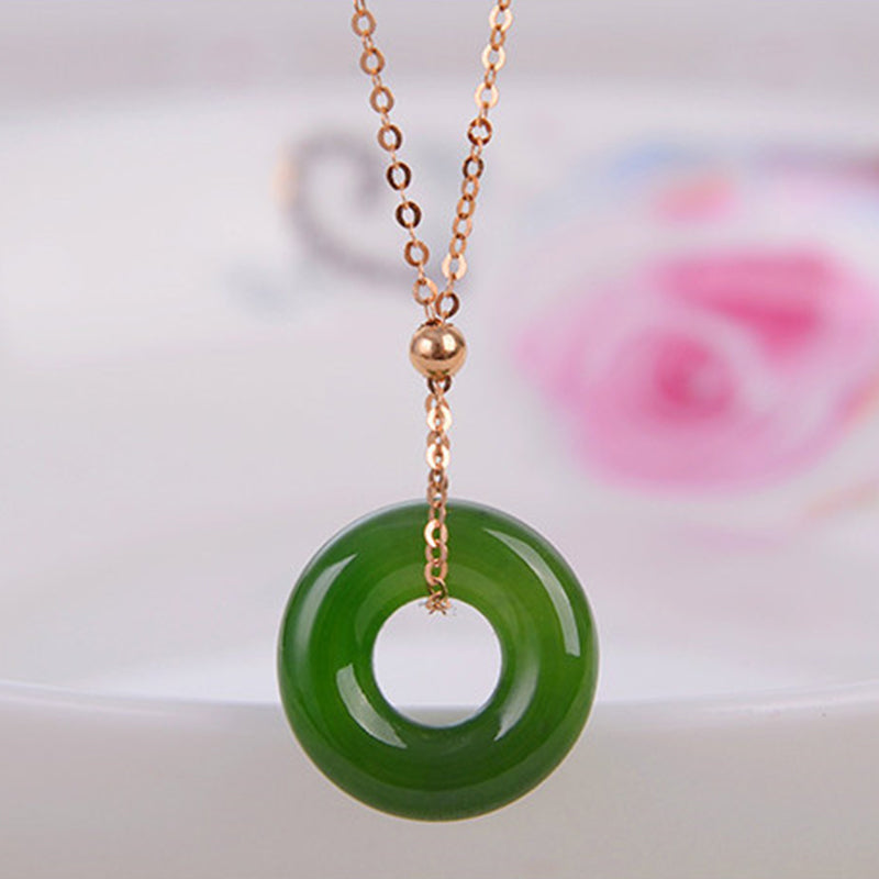 Colgante de collar de oro de 14 quilates curativo de jade cian redondo