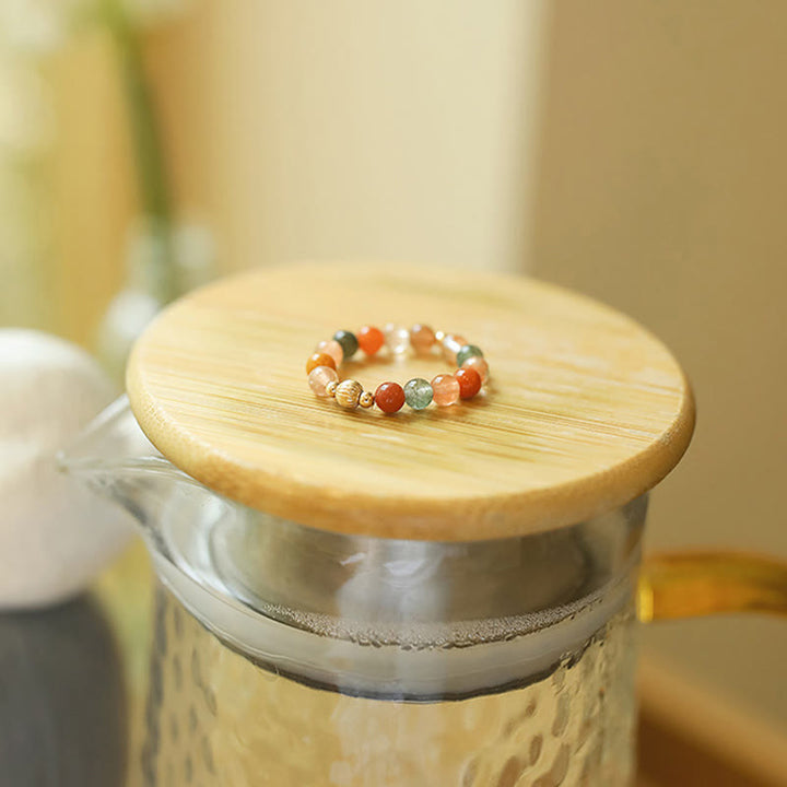 Anillo de riqueza de felicidad con piedra lunar de melocotón y cristal Fu Lu Shou de cobre chapado en oro de 14 quilates con Buddha Stones