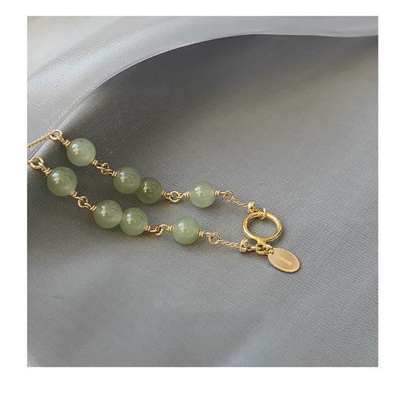 Pulsera con cuentas de suerte llena de oro de 14 quilates con jade hetiano natural único de Buddha Stones