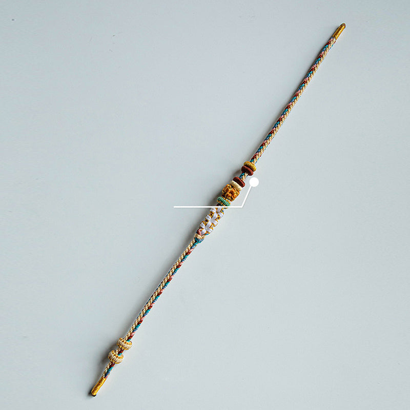 Pulsera de hilo trenzado con diseño de flor de melocotón de color Dunhuang hecha a mano con Buddha Stones