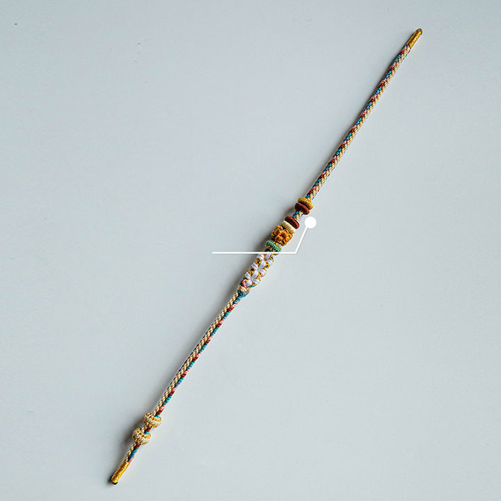 Pulsera de hilo trenzado con diseño de flor de melocotón de color Dunhuang hecha a mano con Buddha Stones