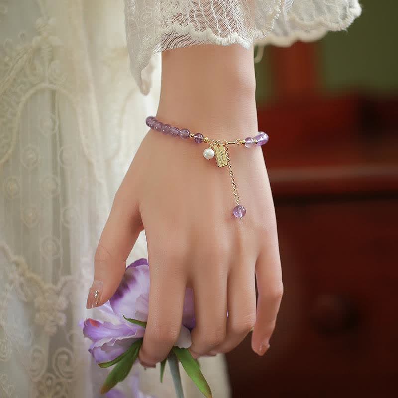 Pulsera de cristal de amatista natural que alivia el estrés.