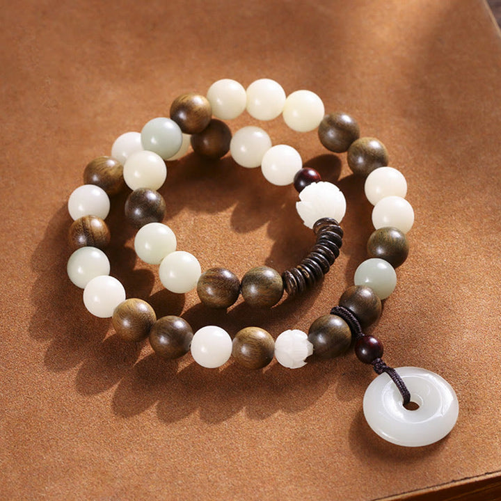 Pulsera de doble envoltura con hebilla de paz y loto de sándalo verde, semilla de Bodhi, Buddha Stones, armonía