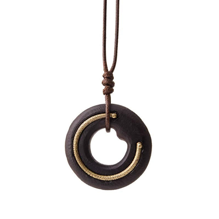 Collar con colgante de madera de ébano con círculo zen y Buddha Stones - image 16