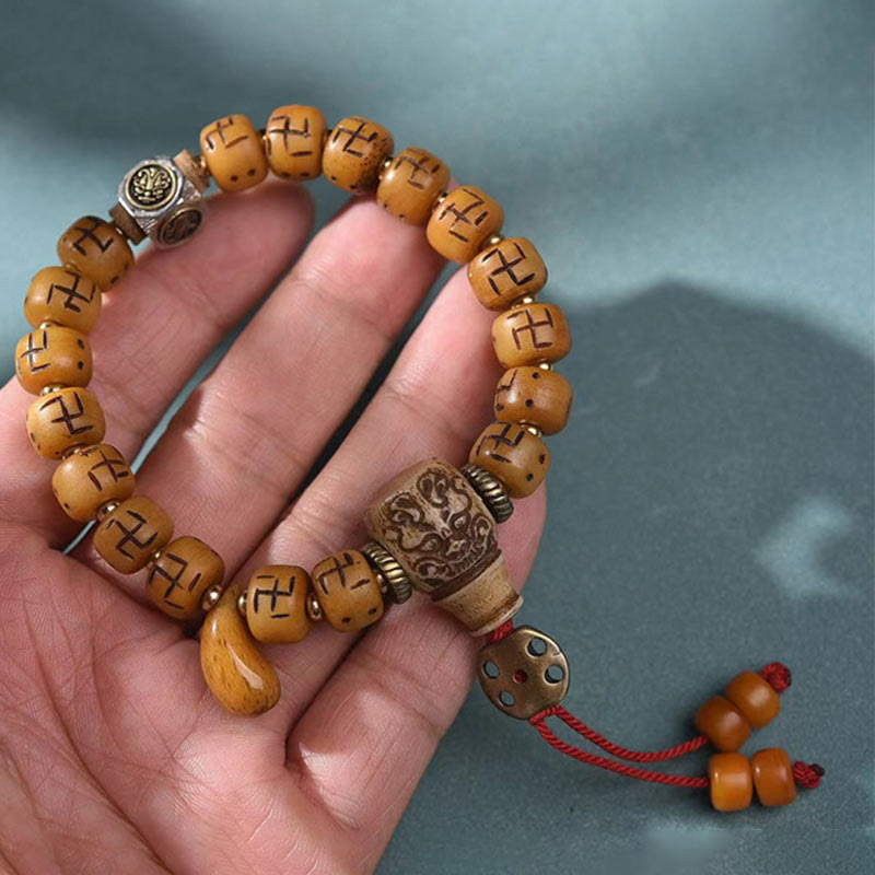 Buddha Stones, hueso de camello tibetano Natural, esvástica, cuentas Dzi, amuleto de Buda Shankha, Kirtimukha, pulsera con borla de protección de la suerte