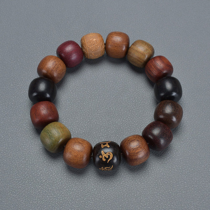 Pulsera de pureza Om Mani Padme Hum de varias maderas del Tíbet con Buddha Stones
