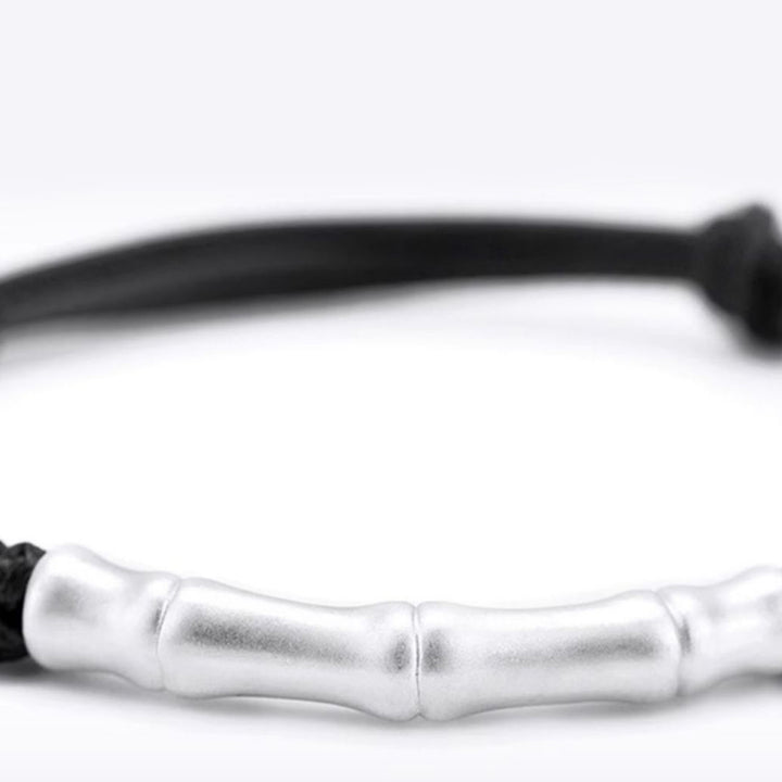 Pulsera trenzada de cuerda de la suerte con patrón de hueso de plata de ley 999 con Buddha Stones