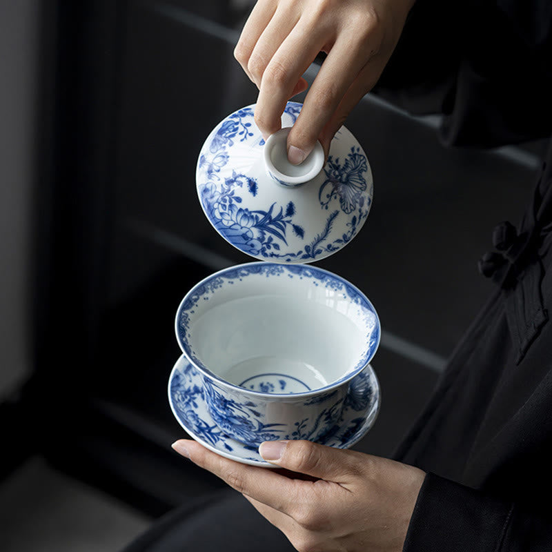 Buddha Stones Porcelana Azul Y Blanca Loto Pez Koi Danza Del León Sandía Cerámica Gaiwan Sancai Taza De Té Kung Fu Taza De Té Y Platillo Con Tapa 300ml